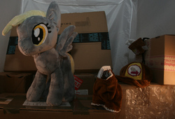Size: 3152x2140 | Tagged: safe, artist:bastler, derpibooru exclusive, derpy hooves, pegasus, pony, g4, cap, clothes, female, hat, high res, irl, mail, mailbag, mailmare, mare, package, photo, plushie, solo, uniform