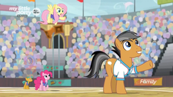 Size: 1366x768 | Tagged: safe, screencap, fluttershy, pinkie pie, quibble pants, snails, earth pony, pony, common ground, g4, audience, clothes, crowd, discovery family logo, field, jersey, shirt, sports outfit, stadium