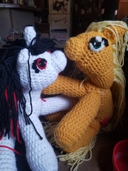 Size: 4032x3024 | Tagged: safe, artist:felistormsstudio, applejack, oc, oc:blackjack, earth pony, pony, unicorn, fallout equestria, fallout equestria: project horizons, g4, crochet, duo, fanfic art, irl, kissing, photo, plushie, smooch