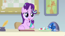 Size: 1366x768 | Tagged: safe, screencap, starlight glimmer, pony, g4, student counsel, armband, bulletin board, desk, discovery family logo, female, inkwell, mare, office, quill, solo