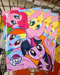 Size: 2189x2726 | Tagged: safe, fluttershy, pinkie pie, rainbow dash, twilight sparkle, alicorn, pony, g4, official, book, cute, grin, high res, irl, merchandise, my little pony logo, photo, smiling, spread wings, twilight sparkle (alicorn), wings