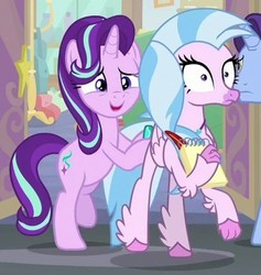 Size: 369x390 | Tagged: safe, screencap, november rain, silverstream, starlight glimmer, classical hippogriff, hippogriff, pony, unicorn, g4, student counsel, butt pushing, butt touch, cropped, duo focus, female, friendship student, hoof on butt, mare, offscreen character, out of context, pushing, rump push, streambutt, wide eyes