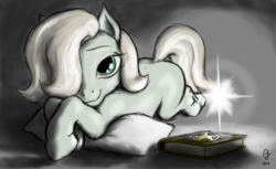 Size: 1800x1100 | Tagged: safe, artist:trefoiler, oc, oc only, oc:emerald jewel, earth pony, pony, colt quest, alternate color palette, bedroom eyes, blank flank, book, colt, femboy, foal, hair over one eye, light spell, looking at you, lying down, magic, male, pillow, prone, smiling, solo