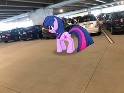 Size: 4032x3024 | Tagged: safe, gameloft, photographer:undeadponysoldier, twilight sparkle, pony, unicorn, g4, augmented reality, car, female, florida, irl, mare, orlando, parking deck, parking lot, photo, ponies in real life, solo, suv, unicorn twilight, vacation, vehicle