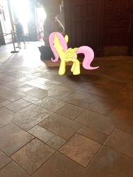 Size: 3024x4032 | Tagged: safe, photographer:undeadponysoldier, fluttershy, human, pegasus, pony, g4, be our guest restaurant, disney world, female, florida, irl, irl human, magic kingdom, mare, orlando, photo, ponies in real life, queue, restaurant, rope