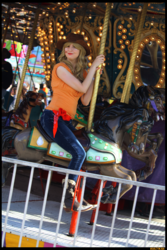 Size: 3456x5184 | Tagged: safe, artist:krazykari, applejack, human, g4, carousel, clothes, cosplay, costume, irl, irl human, photo, solo