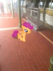 Size: 3024x4032 | Tagged: safe, photographer:undeadponysoldier, scootaloo, human, pegasus, pony, g4, cute, cutie mark, disney world, female, filly, florida, gate, irl, irl human, magic kingdom, monorail, orlando, photo, ponies in real life, station, the cmc's cutie marks, train station, vacation