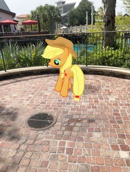Size: 3024x4032 | Tagged: safe, gameloft, photographer:undeadponysoldier, applejack, earth pony, pony, g4, augmented reality, building, disney springs, disney world, downtown disney, female, florida, irl, manhole, mare, orlando, photo, ponies in real life, solo, umbrella, water