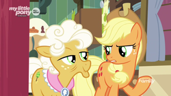 Size: 1600x900 | Tagged: safe, screencap, applejack, goldie delicious, earth pony, pony, g4, going to seed, discovery family logo, duo, female, mare, my little pony logo, raised hoof
