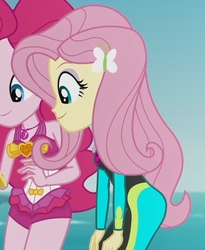 Size: 2100x2555 | Tagged: safe, screencap, fluttershy, pinkie pie, equestria girls, g4, my little pony equestria girls: better together, unsolved selfie mysteries, beach, clothes, cropped, duo, female, flutterbutt, fluttershy's wetsuit, geode of fauna, geode of sugar bombs, high res, magical geodes, pinkie pie swimsuit, swimsuit, wetsuit