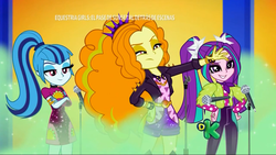Size: 1280x720 | Tagged: safe, screencap, adagio dazzle, aria blaze, sonata dusk, equestria girls, equestria girls series, g4, sunset's backstage pass!, spoiler:eqg series (season 2), clothes, discovery family logo, female, human scum, mic drop, microphone, pigtails, ponytail, spiked headband, the dazzlings, trio