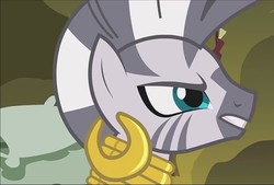Size: 1065x720 | Tagged: safe, screencap, zecora, pony, zebra, bridle gossip, g4, angry, beautiful, bed, bust, cyan eyes, ear piercing, earring, female, furious, gritted teeth, how dare you?, insulted, jewelry, looking at someone, mare, mohawk, narrowed eyes, neck rings, piercing, portrait, profile, solo, stripes, yelling, zecora is not amused, zecora's hut