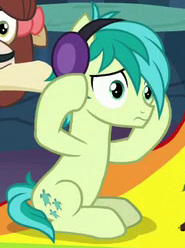 Size: 185x248 | Tagged: safe, screencap, sandbar, yona, earth pony, pony, g4, uprooted, cropped, frown, headphones, hooves, male, offscreen character, solo focus