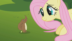 Size: 1280x720 | Tagged: safe, screencap, fluttershy, pegasus, pony, squirrel, g4, swarm of the century, cute, dandelion, female, shyabetes, smiling