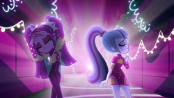 Size: 1336x752 | Tagged: safe, screencap, adagio dazzle, aria blaze, sonata dusk, equestria girls, find the magic, g4, my little pony equestria girls: better together, duo, duo female, female, ponytail, pose, taco dress, the dazzlings, the dazzlings have returned