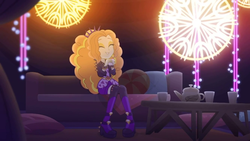 Size: 1336x752 | Tagged: safe, screencap, adagio dazzle, equestria girls, find the magic, g4, my little pony equestria girls: better together, bracelet, clothes, couch, cup, headband, jacket, jewelry, leather jacket, pillow, pose, shorts, spiked headband, spiked wristband, table, tea set, teacup, wristband