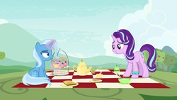 Size: 1920x1080 | Tagged: safe, screencap, starlight glimmer, trixie, pony, g4, student counsel, bracelet, cup, cupcake, food, jewelry, kettle, magic, picnic blanket, sandwich, teacup, unamused