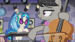 Size: 1669x939 | Tagged: safe, screencap, dj pon-3, octavia melody, vinyl scratch, earth pony, pony, unicorn, g4, slice of life (episode), background pony, bipedal, bow, bow (instrument), cello, cropped, disco ball, duo, female, headphones, lidded eyes, looking at each other, mare, musical instrument, smiling, synthesizer, turntable