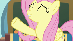 Size: 1280x720 | Tagged: safe, screencap, fluttershy, pegasus, pony, g4, she's all yak, eyes closed, female, mare, raised hoof, solo