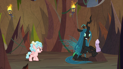 Size: 1280x720 | Tagged: safe, screencap, cozy glow, queen chrysalis, changeling, changeling queen, pegasus, pony, frenemies (episode), g4, duo, female, filly, foal, log, sitting, torch