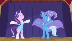 Size: 1920x1080 | Tagged: safe, artist:phucknuckl, starlight glimmer, trixie, pony, unicorn, g4, assistant, bipedal, bowtie, cape, clothes, cutie mark, eyes closed, hat, hoof gloves, leotard, open mouth, outstretched arms, rearing, requested art, smiling, stage, trixie's cape, trixie's hat, underhoof, wizard hat