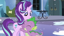 Size: 1280x720 | Tagged: safe, screencap, spike, starlight glimmer, dragon, pony, unicorn, g4, the crystalling, adorable face, cute, cute smile, daaaaaaaaaaaw, eyes closed, female, hug, mare, shipping fuel, smiling, snow, spikelove, table