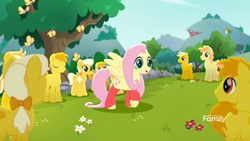 Size: 1366x768 | Tagged: safe, screencap, fluttershy, butterfly, earth pony, pegasus, pony, g4, rainbow roadtrip, background pony, bow, clone, clothes, crowd, discovery family logo, dot cutie mark, female, flower, hair bow, hill, leg warmers, male, mare, raised hoof, stallion, tree, unnamed character, unnamed pony, yellow, yellow pony