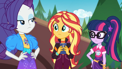 Size: 1920x1080 | Tagged: safe, screencap, rarity, sci-twi, sunset shimmer, twilight sparkle, equestria girls, equestria girls series, festival filters, spoiler:eqg series (season 2), bolero jacket, cellphone, clothes, female, frown, geode of empathy, geode of fauna, geode of shielding, geode of sugar bombs, geode of super speed, geode of super strength, geode of telekinesis, glasses, hand on hip, jacket, magical geodes, music festival outfit, outdoors, phone, ponytail, smartphone, trio, trio female