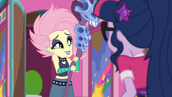 Size: 1366x768 | Tagged: safe, screencap, fluttershy, sci-twi, twilight sparkle, equestria girls, g4, my little pony equestria girls: choose your own ending, the road less scheduled, the road less scheduled: fluttershy, choker, clothes, crystal skull staff, duo, duo female, ear piercing, earring, eyeshadow, female, flutterpunk, geode of telekinesis, goth, grin, jewelry, lipstick, looking at each other, looking at someone, magical geodes, makeup, metalshy, midriff, piercing, purple lipstick, skull, sleeveless, smiling, tank top