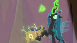 Size: 1920x1080 | Tagged: safe, screencap, queen chrysalis, twilight sparkle, changeling, changeling queen, frenemies (episode), g4, better way to be bad, crown, doll, female, glowing horn, horn, jewelry, magic, regalia, telekinesis, toy