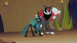 Size: 1280x720 | Tagged: safe, screencap, cozy glow, lord tirek, queen chrysalis, centaur, changeling, changeling queen, pegasus, pony, frenemies (episode), g4, bickering, bow, cloven hooves, evil lair, female, filly, floppy ears, flying, foal, former queen chrysalis, grogar's lair, hair bow, horns, insect wings, lair, male, nose piercing, nose ring, piercing, raised hoof, septum piercing, spread wings, trio, wings