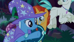 Size: 1920x1080 | Tagged: safe, screencap, sunburst, terramar, trixie, hippogriff, pony, unicorn, g4, student counsel, cape, clothes, female, flying, hat, male, mare, pointing, stallion, trio, trixie's cape, trixie's hat