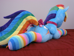 Size: 3968x2976 | Tagged: safe, artist:qtpony, rainbow dash, pony, g4, bow, butt, choker, clothes, dock, female, high res, irl, photo, plot, plushie, socks, solo, striped socks, tail bow