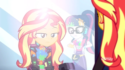 Size: 1280x720 | Tagged: safe, screencap, sci-twi, sunset shimmer, twilight sparkle, equestria girls, equestria girls series, g4, sunset's backstage pass!, spoiler:eqg series (season 2), clothes, discovery family logo, female, geode of empathy, glasses, jacket, magical geodes, messy, mirror, paint, ponytail