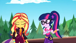 Size: 1366x768 | Tagged: safe, screencap, sci-twi, sunset shimmer, twilight sparkle, equestria girls, equestria girls specials, g4, my little pony equestria girls: better together, my little pony equestria girls: sunset's backstage pass, bad pun, discovery family logo, fake smile, geode of empathy, geode of telekinesis, magical geodes, pun, smiling, wristband