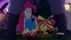 Size: 1366x768 | Tagged: safe, screencap, max steele, pinkie pie, sunset shimmer, equestria girls, equestria girls series, g4, sunset's backstage pass!, spoiler:eqg series (season 2), broken, clothes, discovery family logo, female, food cart, framed by legs, night, pointing, shoes, sneakers, wristband