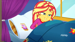 Size: 1366x768 | Tagged: safe, screencap, sunset shimmer, equestria girls, equestria girls specials, g4, my little pony equestria girls: better together, my little pony equestria girls: sunset's backstage pass, bed, curtains, discovery family logo, happy, phone, pillow, sleeping, solo, tired, window