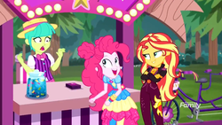 Size: 1366x768 | Tagged: safe, screencap, belle barker, pinkie pie, sunset shimmer, equestria girls, equestria girls series, g4, sunset's backstage pass!, spoiler:eqg series (season 2), background human, bicycle, booth, carny, crossed arms, discovery family logo, female, forest, jar, jelly beans, lights, music festival outfit, tandem bicycle, vendor