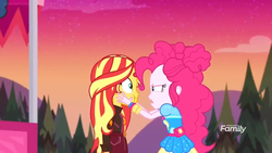 Size: 1366x768 | Tagged: safe, screencap, pinkie pie, sunset shimmer, equestria girls, equestria girls series, g4, sunset's backstage pass!, spoiler:eqg series (season 2), cheek squish, discovery family logo, evening, eye contact, looking at each other, squishy cheeks