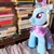 Size: 864x864 | Tagged: safe, trixie, pony, unicorn, g4, book, bookshelf, cape, clothes, female, hat, irl, photo, plushie, solo, trixie's cape, trixie's hat