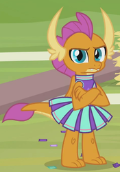 Size: 476x680 | Tagged: safe, screencap, smolder, dragon, 2 4 6 greaaat, g4, betrayed, cheerleader, cheerleader outfit, cheerleader smolder, claws, clothes, confetti, crossed arms, cute, cute when angry, displeased, dragoness, female, folded wings, frown, horns, kid, looking at you, skirt, slit pupils, smolder is not amused, smolderbetes, solo, teenaged dragon, teenager, toes, unamused, upset