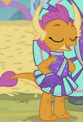Size: 290x429 | Tagged: safe, screencap, smolder, dragon, 2 4 6 greaaat, g4, arrogant, cheerleader outfit, cheerleader smolder, clothes, cloven hooves, cute, dragoness, eyes closed, female, hand on hip, horns, open mouth, outdoors, pleated skirt, pom pom, pride, skirt, smiling, smolderbetes, smug, solo, talking, toes
