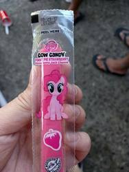 Size: 474x632 | Tagged: safe, pinkie pie, g4, cheese, cow candy, food, merchandise, photo, plastic, sitting, strawberry, string cheese