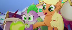 Size: 1920x804 | Tagged: safe, screencap, applejack, spike, dragon, earth pony, pony, g4, my little pony: the movie, applejack's hat, cowboy hat, female, fire, green fire, hat, male, mare, smiling