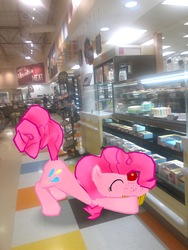 Size: 3024x4032 | Tagged: safe, gameloft, photographer:undeadponysoldier, pinkie pie, pony, g4, augmented reality, cake, cherry, cupcake, eating, female, food, grocery store, irl, lowes foods, mare, photo, ponies in real life