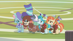 Size: 1360x768 | Tagged: safe, screencap, lighthoof, ocellus, shimmy shake, yona, earth pony, pony, yak, 2 4 6 greaaat, g4, bow, clothes, cloven hooves, face paint, female, fence, field, flag, hair bow, hat, monkey swings, outdoors, pleated skirt, ponytail, ribbon, scarf, skirt, sweater, top hat, whistle, wig