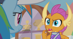 Size: 1248x680 | Tagged: safe, screencap, rainbow dash, smolder, pony, 2 4 6 greaaat, g4, angry, cabinet, cap, cheerleader, cheerleader outfit, cheerleader smolder, clothes, coach rainbow dash, gym, hat, trophy, whistle