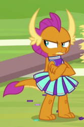 Size: 318x478 | Tagged: safe, screencap, smolder, dragon, 2 4 6 greaaat, g4, angry, cheerleader outfit, cheerleader smolder, claws, clothes, confetti, cropped, cute, displeased, dragoness, fangs, female, horns, madorable, skirt, smolderbetes, solo, teenaged dragon, toes, unamused, upset