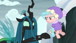 Size: 1920x1080 | Tagged: safe, screencap, cozy glow, queen chrysalis, changeling, changeling queen, pegasus, pony, frenemies (episode), g4, clothes, cozy glow is not amused, duo, female, filly, foal, hat, raised hoof, winter outfit
