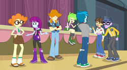 Size: 1280x714 | Tagged: safe, screencap, cherry crash, microchips, mystery mint, scribble dee, thunderbass, valhallen, wiz kid, equestria girls, g4, my little pony equestria girls: rainbow rocks, argument, background human, boots, clothes, converse, crossed arms, female, glasses, male, pants, sandals, shoes, sneakers, stage